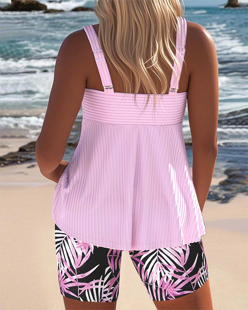 Striped Tankini with Printed Top and Matching Beach Shorts

Rewritten: "Striped Tankini with Decorative Top and Matching Beach Shorts"