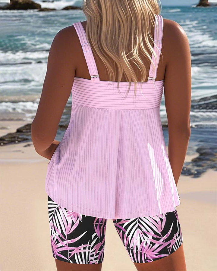 Striped Tankini with Printed Top and Matching Beach Shorts

Rewritten: "Striped Tankini with Decorative Top and Matching Beach Shorts"